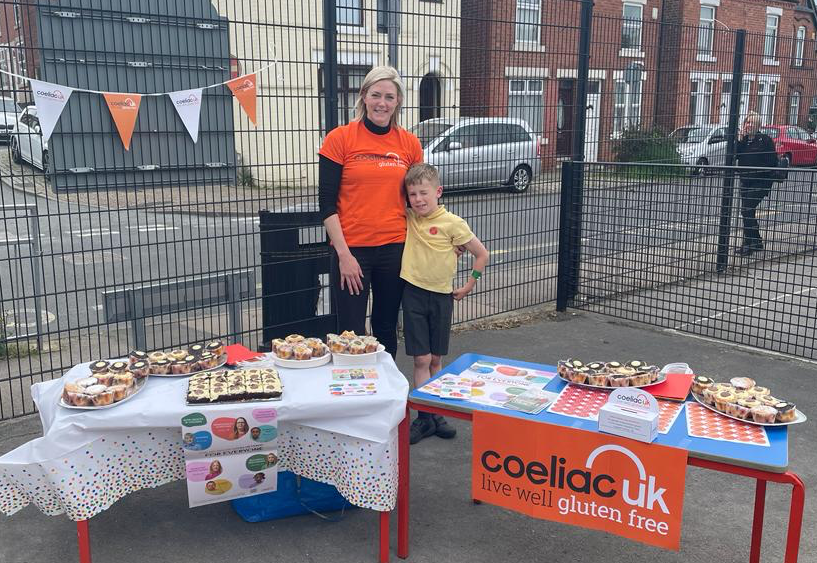 mum and son at bake sale