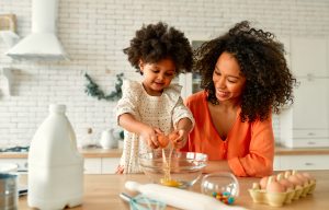 Mum and daughter cooking