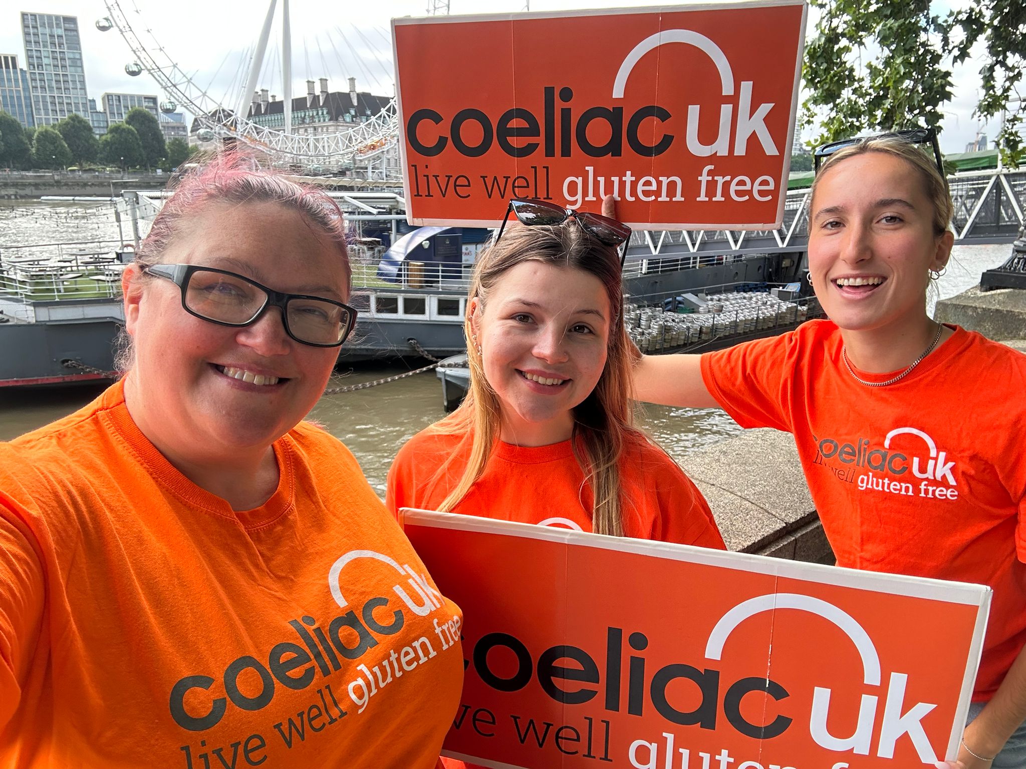 fundraising team on in London wearing orange