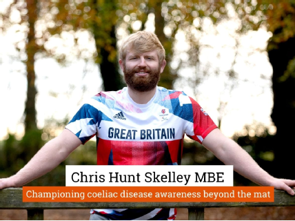 Paralympic champion Chris Skelley smiling in a Team GB T-shirt, showing his support for Coeliac UK.