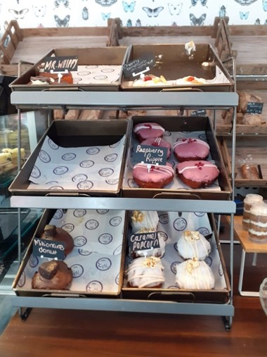 Selection of cakes on shelves