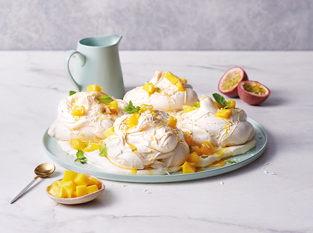 Aldi White Chocolate Meringues with chopped mango and passion fruit coulis 