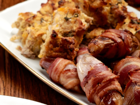 Roasted shallots in bacon blanket 