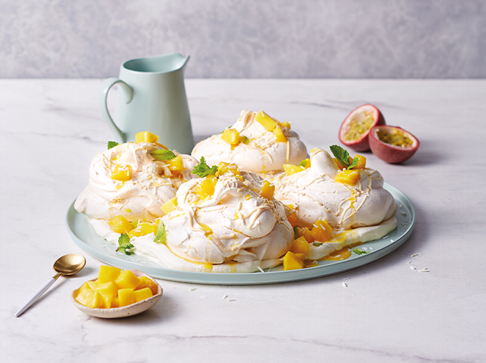 Aldi White Chocolate Meringues with chopped mango and passion fruit coulis 