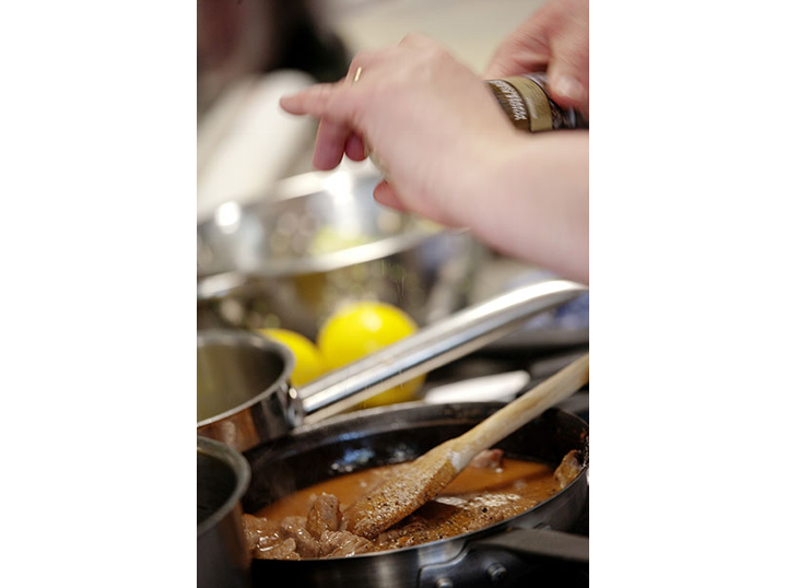 Carol Salisbury cooking up the beef for her beef and mushroom pie main course.