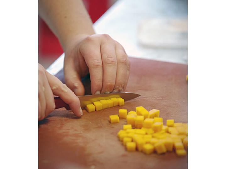 Jonathan preparing butternut squash for his main course