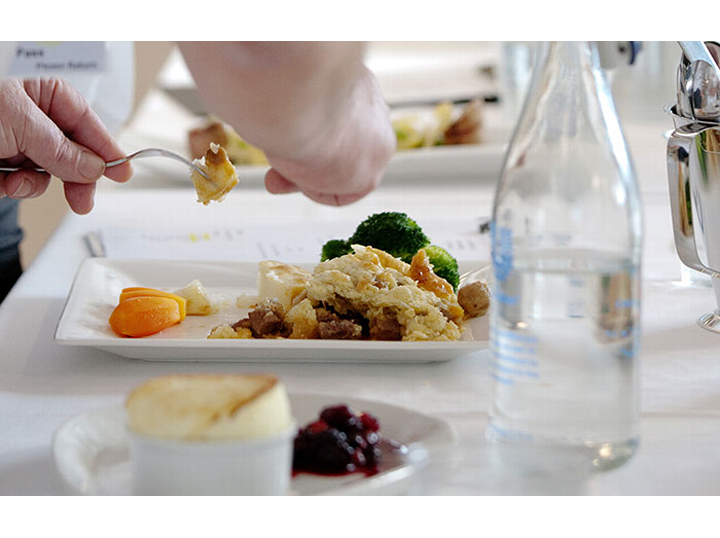 Judges tasting Carol's main course