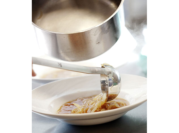 Kathryn serving French Onion Soup